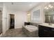 The ensuite bath includes a soaking tub, double vanity and access to a walk-in closet at 104 Bailey Park Ct, Cary, NC 27513