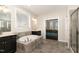 The bathroom includes a soaking tub and dual sinks at 104 Bailey Park Ct, Cary, NC 27513
