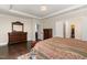 Main bedroom featuring wood floors and doorway leading to main bath at 104 Bailey Park Ct, Cary, NC 27513