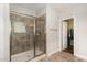 Walk-in shower features glass door, and leads to walk-in closet at 104 Bailey Park Ct, Cary, NC 27513