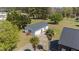 Detached garage with palm trees in the front yard at 1055 Tilghman Rd, Dunn, NC 28334