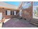 A spacious red brick patio offers an excellent outdoor living space at 1055 Tilghman Rd, Dunn, NC 28334