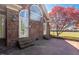 Back patio with brick home at 1055 Tilghman Rd, Dunn, NC 28334