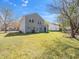 Expansive backyard view featuring a two-story home with plenty of green space perfect for outdoor activities at 106 Mingocrest Dr, Knightdale, NC 27545