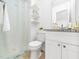 Bathroom with a toilet, vanity with granite countertop, and shower at 106 Mingocrest Dr, Knightdale, NC 27545