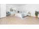Bedroom featuring a queen bed, hardwood floors, and natural light at 106 Mingocrest Dr, Knightdale, NC 27545