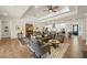 Spacious living area with open layout, connecting kitchen, dining, and Gathering room at 1113 Cryptic Wood Ave, Fuquay Varina, NC 27526
