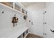 Mudroom features built-in bench with storage and hooks for organization at 1113 Cryptic Wood Ave, Fuquay Varina, NC 27526