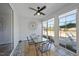 Bright sunroom features tiled floor, modern furniture, and large windows at 1113 Cryptic Wood Ave, Fuquay Varina, NC 27526