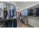 Spacious walk-in closet with ample shelving and hanging space for organized storage at 1113 Cryptic Wood Ave, Fuquay Varina, NC 27526