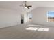 Expansive bedroom features large windows, plush carpet and an ensuite bathroom at 1113 Ursa Major Ct, Wendell, NC 27591