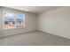 Bright bedroom with large window offering a pleasant view at 1113 Ursa Major Ct, Wendell, NC 27591