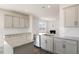 Well-lit kitchen with granite countertops, stainless steel appliances and white subway tile backsplash at 1113 Ursa Major Ct, Wendell, NC 27591