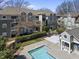 Inviting apartment complex featuring a pool, charming balconies, and lush landscaping offers a comfortable living environment at 1121 Parkridge Ln # 207, Raleigh, NC 27605