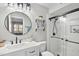 Modern bathroom featuring sleek fixtures, glass-enclosed shower, and stylish vanity at 1121 Parkridge Ln # 207, Raleigh, NC 27605