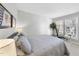 Comfortable bedroom with a work space, natural light, and a pleasant view at 1121 Parkridge Ln # 207, Raleigh, NC 27605