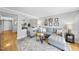 Inviting living room showcasing open layout, comfortable seating, and an abundance of natural light at 1121 Parkridge Ln # 207, Raleigh, NC 27605