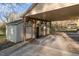 Covered carport area providing ample space for vehicle parking and storage at 1122 Snow Hill Rd, Durham, NC 27712