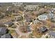 Aerial view of a residential area near Devils Ridge Golf Course and neighborhood cart path at 116 Arlen Park Pl, Holly Springs, NC 27540