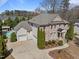 Beautiful brick home with a two-car garage and a pool in the backyard, landscaped for privacy at 116 Arlen Park Pl, Holly Springs, NC 27540