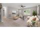 Inviting living room with stylish decor, ceiling fan, and new floors and freshly painted walls at 1209 Freeman Dr, Sanford, NC 27330