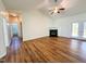 Bright living room features a fireplace, hardwood flooring and easy access to the backyard at 1220 E Middleton Dr, Creedmoor, NC 27522