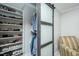 Walk-in closet with built-in shelving for ample shoe and clothing storage, featuring a sliding barn door at 1403 Copper Cir, Mebane, NC 27302