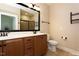 Bathroom featuring double sinks, a large mirror, a tiled floor, and ample cabinet space at 1503 Orchard Villas Ave, Apex, NC 27502