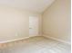 Bright bedroom with plush carpeting and a closet door at 1503 Orchard Villas Ave, Apex, NC 27502