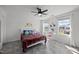 Bedroom with a ceiling fan, two windows, and decor on the wall at 151 Kutter Dr, Elon, NC 27244