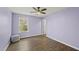 Bright bedroom with hardwood floors, ample natural light, and a serene ambiance, ideal for relaxation at 1720 Highpoint St, Wake Forest, NC 27587