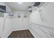 Spacious walk-in closet with wire shelving and laminate flooring, perfect for organized storage at 1720 Highpoint St, Wake Forest, NC 27587