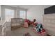 Cozy bedroom for a features playful decor and soft natural light at 1805 Kauri Cliffs Dr, Fuquay Varina, NC 27526