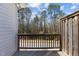 Wooden deck area perfect for outdoor relaxing and enjoying the views from a wooded backdrop at 1805 Kauri Cliffs Dr, Fuquay Varina, NC 27526