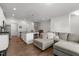 Open-concept living space combining a kitchen island and living room area at 1805 Kauri Cliffs Dr, Fuquay Varina, NC 27526