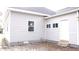 Exterior view of home with new vinyl siding and white door at 216 S Tillery St, Rocky Mount, NC 27804