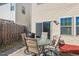 Backyard patio area with outdoor seating and BBQ, perfect for entertaining at 2216 Tanners Mill Dr, Durham, NC 27703