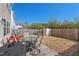 Backyard features a patio set, shed, and well-maintained lawn at 2216 Tanners Mill Dr, Durham, NC 27703