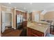 Well-equipped kitchen featuring stainless steel appliances and a breakfast bar area at 2216 Tanners Mill Dr, Durham, NC 27703