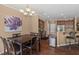 Open kitchen with a dining area and modern appliances, creating a welcoming space at 2216 Tanners Mill Dr, Durham, NC 27703