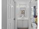 Clean bathroom featuring a vanity, mirror, and toilet, providing a functional and tidy space at 2245 Ventana Ln, Raleigh, NC 27604