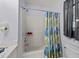 Clean bathroom with a tub, shower, floral curtain, and modern fixtures for comfort at 2245 Ventana Ln, Raleigh, NC 27604
