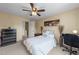 Serene bedroom with ceiling fan, neutral tones, and comfortable furnishings for a relaxing retreat at 2245 Ventana Ln, Raleigh, NC 27604