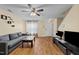 Comfortable living room with neutral walls, ceiling fan, and plenty of natural light at 2245 Ventana Ln, Raleigh, NC 27604