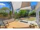 Spacious backyard with a wooden deck, comfortable seating, and lush landscaping, perfect for outdoor enjoyment at 2330 Glascock St, Raleigh, NC 27610