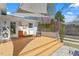 Inviting backyard with a multi-level wooden deck, cozy seating, and beautiful garden views at 2330 Glascock St, Raleigh, NC 27610