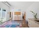 Open living room with bright lighting, modern cabinets, and a colorful area rug at 2330 Glascock St, Raleigh, NC 27610