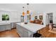 Inviting living area features a spacious open layout, a cozy seating area, and lots of natural light at 2330 Glascock St, Raleigh, NC 27610