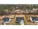 Aerial view of a home with a large backyard, shed, and surrounded by lush green trees at 240 Northview Dr, Middlesex, NC 27557