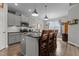 Charming kitchen with stainless appliances, granite countertops, and island seating at 240 Northview Dr, Middlesex, NC 27557